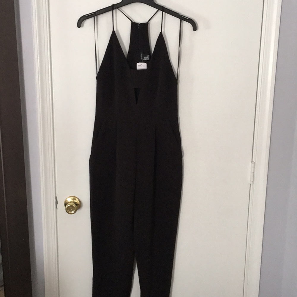 Forever21 black jumpsuit w/racer back and pockets